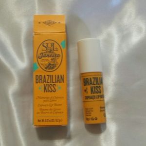 NIB. Sol De Janeiro Brazilian Kiss lip butter.